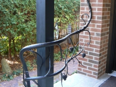 hand-forged-wrought-iron-tree-railing-1